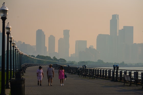 The Jersey City skyline is seen through a cover of wildfire smoke, in Jersey City, N.J., Friday, July 17, 2026. (AP Photo/Ryan Murphy)